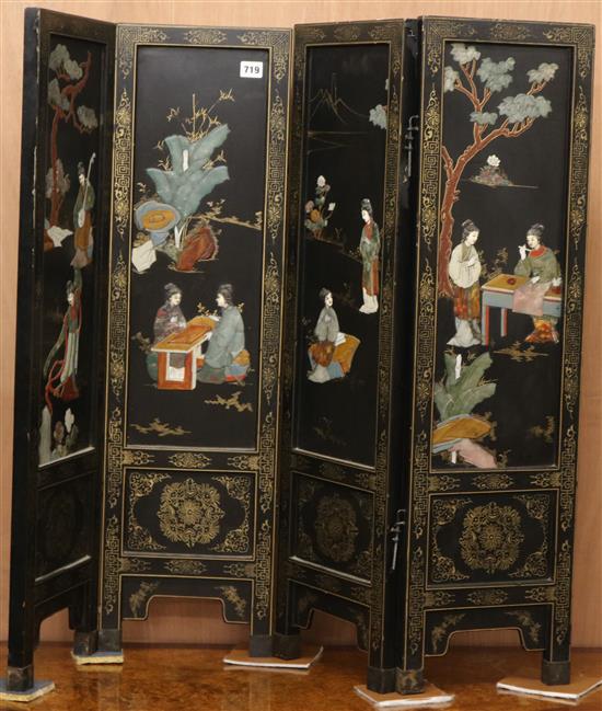 A Chinese black lacquered and hardstone four fold miniature screen, each panel W.26 x H.91cm